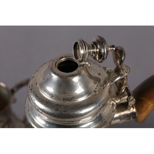 236 - A SILVER THREE PIECE COFFEE SET baluster outline on a plain circular foot, the coffee pot with hinge... 