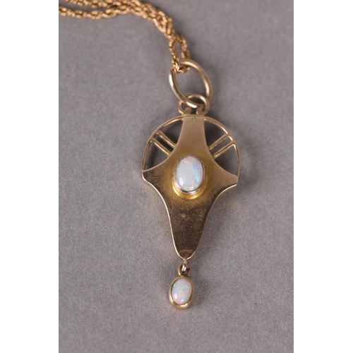 329 - AN ART NOUVEAU OPAL PENDANT by Merle Bennet & Co in 9ct rose gold, the two oval cabochon stones coll... 