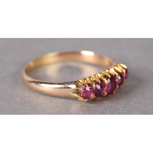 328 - A VICTORIAN RHODALITE GARNET FIVE STONE RING in 9ct rose gold, the graduated circular faceted stones... 