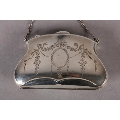 279 - A GEORGE V SILVER PURSE engraved to the front with ribbon tied swags and oval open cartouche hung on... 