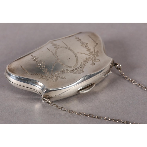 279 - A GEORGE V SILVER PURSE engraved to the front with ribbon tied swags and oval open cartouche hung on... 