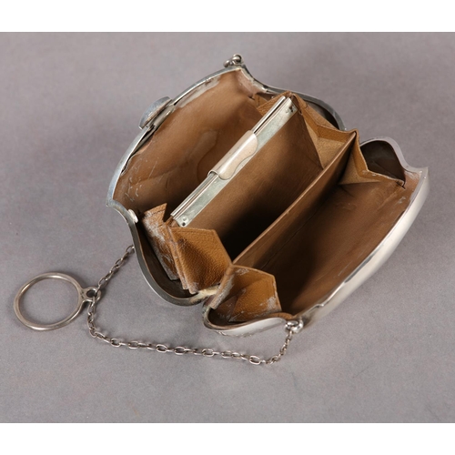 279 - A GEORGE V SILVER PURSE engraved to the front with ribbon tied swags and oval open cartouche hung on... 