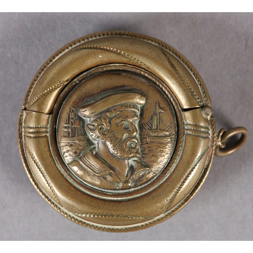 275 - AN EDWARD VII NOVELTY VESTA CASE of circular outline as a lifebuoy with the raised portrait of a bea... 