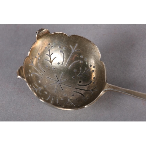 258 - A SCOTTISH SILVER TEA STRAINER c.1970, with pierced and engraved thistle design, hallmarked Edinburg... 