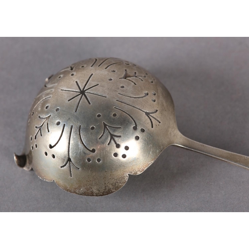 258 - A SCOTTISH SILVER TEA STRAINER c.1970, with pierced and engraved thistle design, hallmarked Edinburg... 