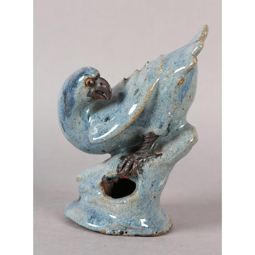 167 - A CHINESE STONEWARE FIGURE OF A HAWK perched on a rock, blue-grey glaze, impressed signature to unde... 