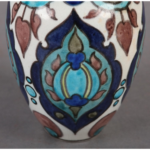 108 - A BURMANTOFT FAIENCE ANGLO PERSIAN VASE BY LEONARD KING, painted with stylised plant forms and oval ... 