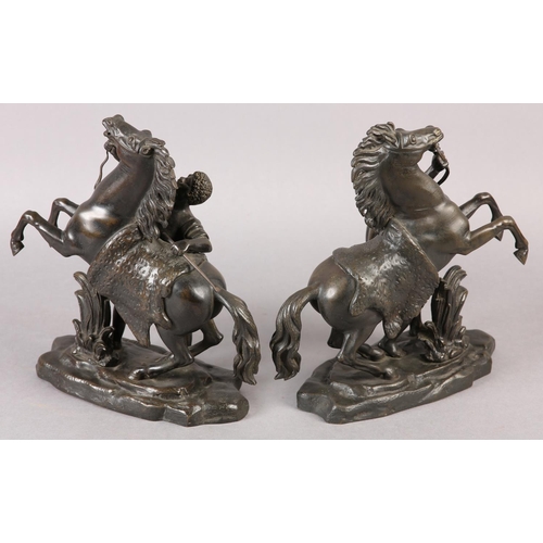 102 - AFTER GUILLAME COUSTEAU, A PAIR OF BRONZE MARLY HORSES AND ATTENDANTS, on naturalistic base, both be... 