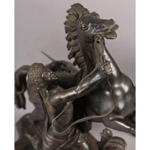 102 - AFTER GUILLAME COUSTEAU, A PAIR OF BRONZE MARLY HORSES AND ATTENDANTS, on naturalistic base, both be... 