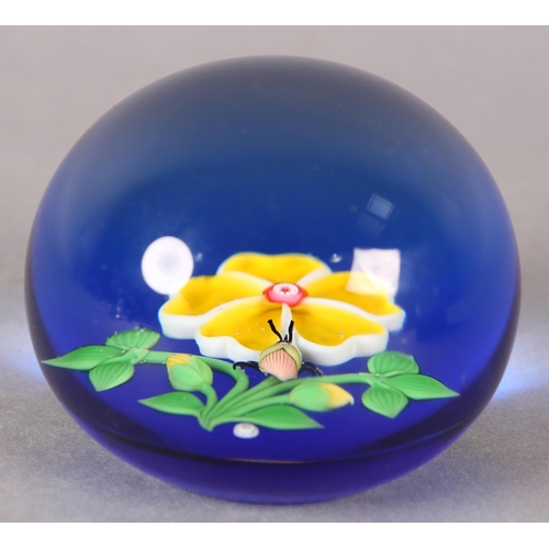 170 - A FRENCH BACCARAT CRYSTAL PAPERWEIGHT 1983, single yellow flower and beetle, on blue, initialled B a... 