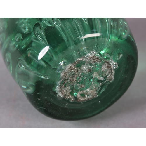 183 - A 19TH CENTURY GREEN GLASS DUMP with bubbles, 9cm high