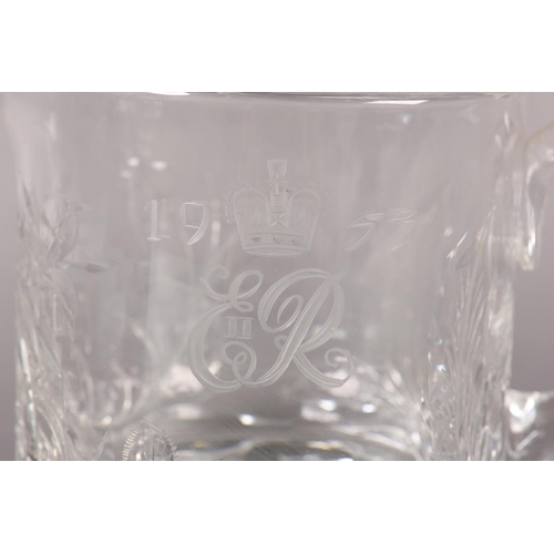 180 - AN ELIZABETH II CORONATION COMMEMORATIVE CUT GLASS WATER JUG etched with crowned cypher and 1953 wit... 