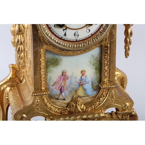 95 - A 19TH CENTURY FRENCH GILT METAL AND PORCELAIN MANTEL CLOCK having a circular dial with black Arabic... 