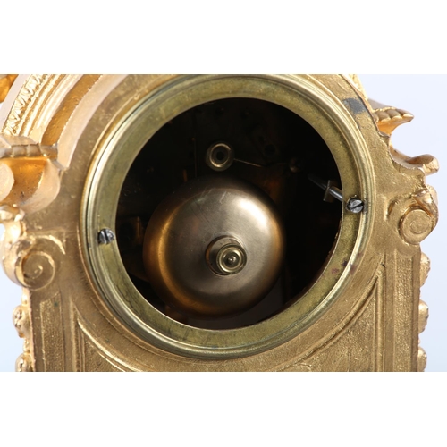 95 - A 19TH CENTURY FRENCH GILT METAL AND PORCELAIN MANTEL CLOCK having a circular dial with black Arabic... 