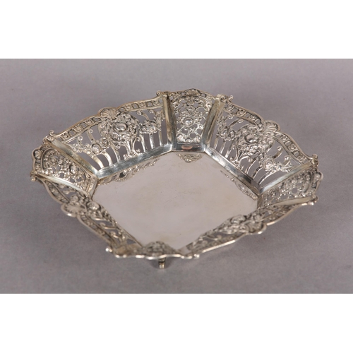 267 - AN EARLY 20TH CENTURY GERMAN .800 SILVER DISH OF OCTAGONAL OUTLINE, pierced and foliate sides over f... 