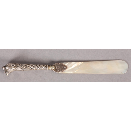 271 - A VICTORIAN SILVER LEOPARD HEAD HANDLED MOTHER-OF-PEARL PAGE TURNER, 19.5cm long, marks rubbed