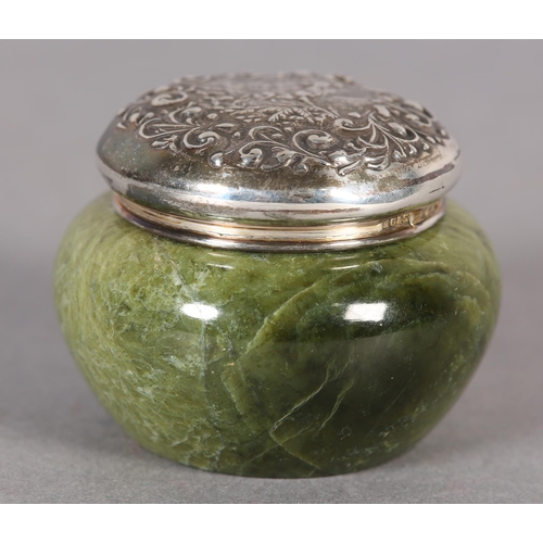 284 - AN EDWARD VII SILVER TOPPED GREEN MARBLE PIN JAR, of circular outline, chased with a representation ... 