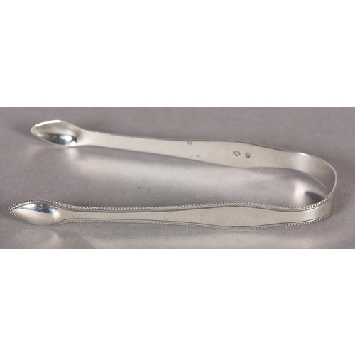 227 - A PAIR OF GEORGE III SILVER SUGAR TONGS with beaded rims, Hester Bateman, approximate weight 1oz