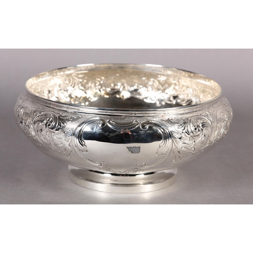 234 - A VICTORIAN SILVER FRUIT BOWL, London 1899, Mappin & Webb, circular, embossed and chased with a bord... 