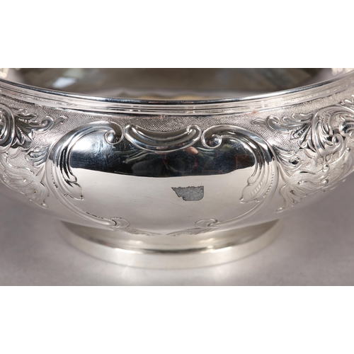 234 - A VICTORIAN SILVER FRUIT BOWL, London 1899, Mappin & Webb, circular, embossed and chased with a bord... 