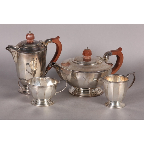 238 - A FOUR PIECE SILVER TEA SET INCLUDING TEAPOT, SUGAR BOWL, HOT WATER AND CREAM JUG, all of tapered fa... 