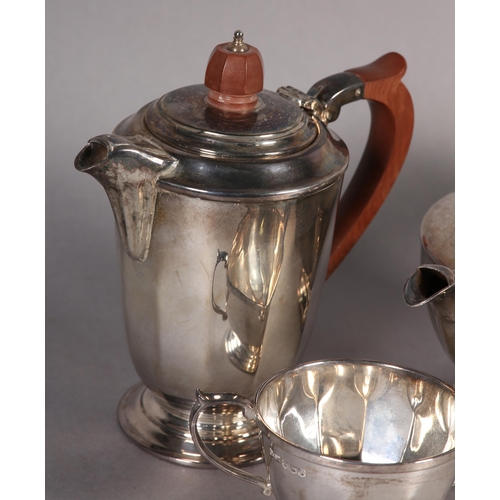 238 - A FOUR PIECE SILVER TEA SET INCLUDING TEAPOT, SUGAR BOWL, HOT WATER AND CREAM JUG, all of tapered fa... 