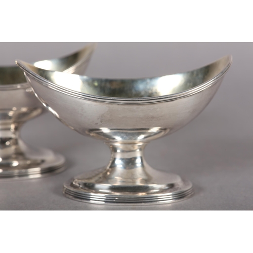 248 - A SET OF FOUR GEORGE III SILVER SALTS, London 1794, Robert Hennell, of boat shape, silver gilt inter... 