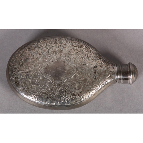 253 - A VICTORIAN SILVER SPIRIT FLASK, of oval outline with foliate scroll engraving and open quatrefoil c... 