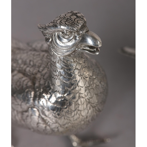 264 - A PAIR OF PHEASANTS NATURALISTICALLY MODELLED IN .835 DUTCH SILVER, c.1920, each approximate 40cm lo... 