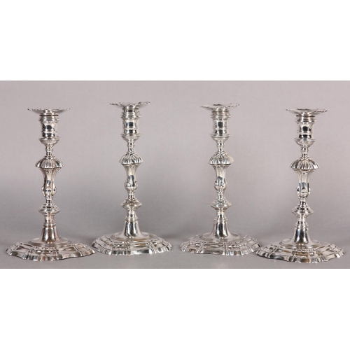 208 - A SET OF FOUR GEORGE II SILVER CANDLESTICKS, London 1750, WM Gould ring turned nozzles with detachab... 