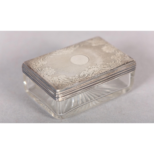 222 - A VICTORIAN SILVER TOPPED GLASS PIN JAR, London 1939, Asprey, rectangular outline, foliate scroll en... 