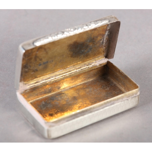 277 - A VICTORIAN SILVER SNUFF BOX of rectangular outline with rounded corners, honey comb engine turned, ... 