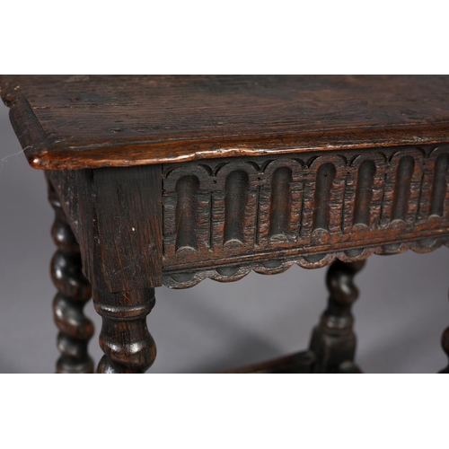 469 - AN EARLY 18TH CENTURY STYLE OAK JOYNT STOOL, the seat with moulded edge above an arcaded apron, on b... 