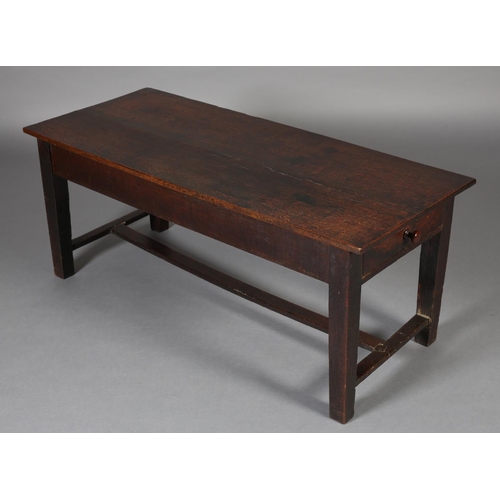 473 - AN OAK LOW SET TABLE, constructed from period timbers, rectangular, having a period drawer to each e... 