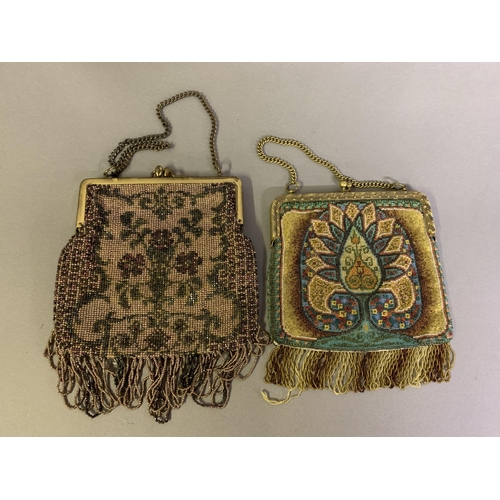 255 - Four 19th/early 20th century beaded bags, all with metal frames: the first, with stylized oriental d... 