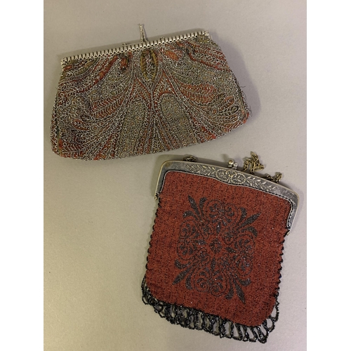 255 - Four 19th/early 20th century beaded bags, all with metal frames: the first, with stylized oriental d... 