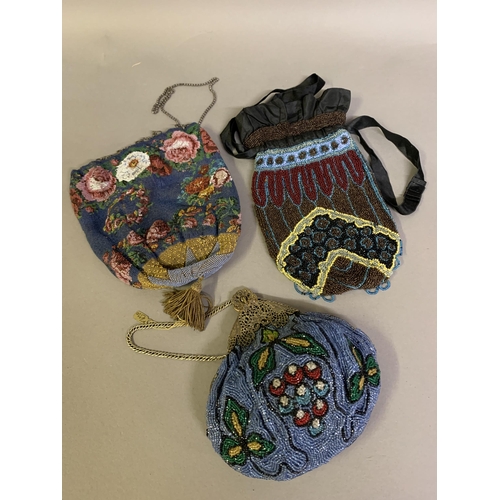 275 - Five good and varied beaded bags from c 1900 to the 1920’s: a good woven bead bag with embossed gold... 