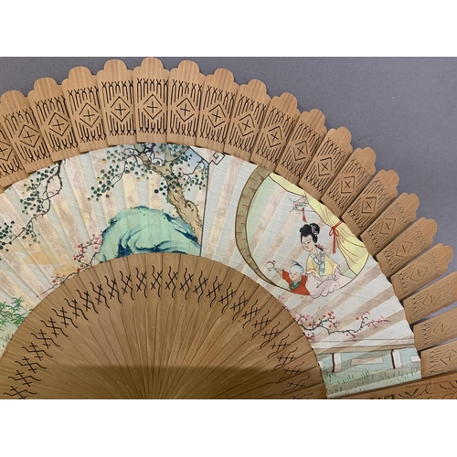 139 - An early 19th century Chinese folding fan, the monture of wood, the head quite bulbous, the guards p... 