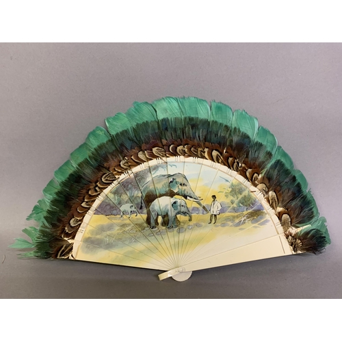 34 - A dainty early 20th century painted bone brisé fan, with central cartouche and two side ovals, flowe... 