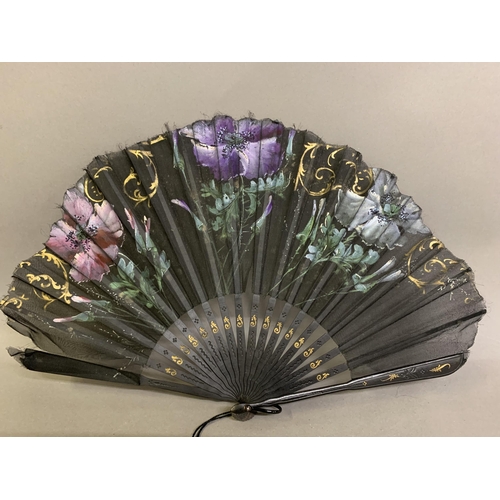 32 - An elegant c 1905 fan in ballon form, the monture shaped, incised and gilded, the olive-green silk l... 