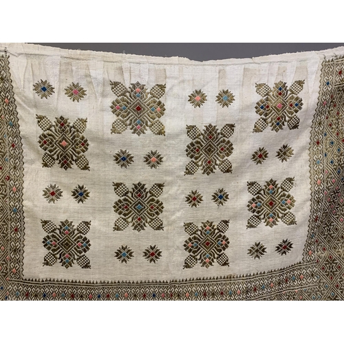 308 - World textiles:  very rectangular large embroidered panel, the deep border along three sides, the to... 