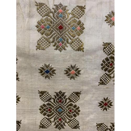 308 - World textiles:  very rectangular large embroidered panel, the deep border along three sides, the to... 