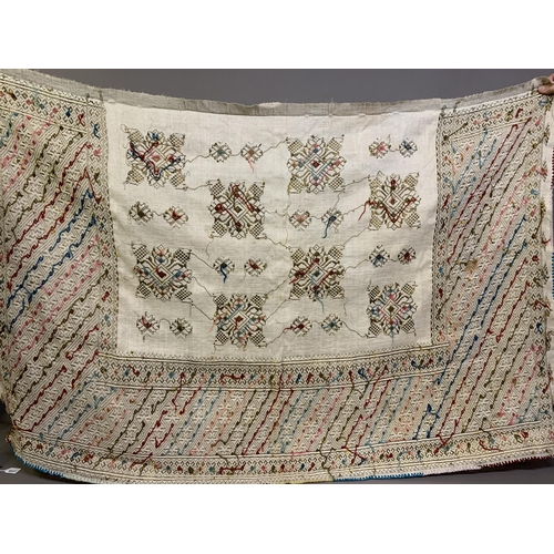 308 - World textiles:  very rectangular large embroidered panel, the deep border along three sides, the to... 