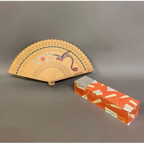 142 - Twentieth century Chinese and Japanese fans: a large folding paper fan, the plain wood sticks with w... 