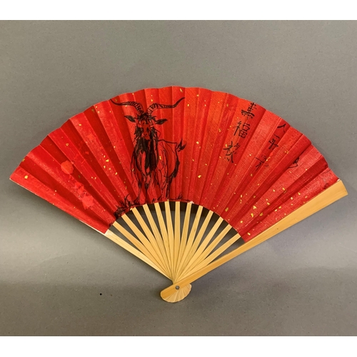 142 - Twentieth century Chinese and Japanese fans: a large folding paper fan, the plain wood sticks with w... 