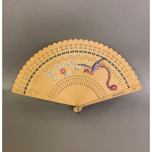 142 - Twentieth century Chinese and Japanese fans: a large folding paper fan, the plain wood sticks with w... 