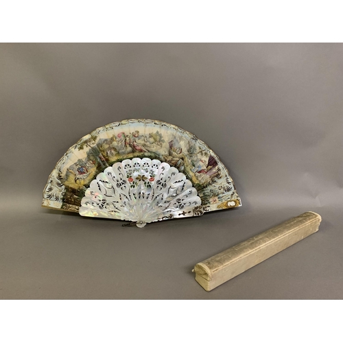 49 - A large and showy mother of pearl fan, the wide sticks gilded and brightly painted with flowers, pie... 