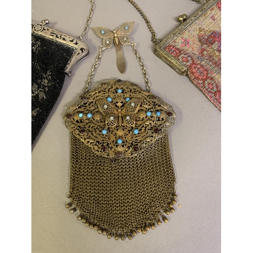 257 - Three good late 19th c to c 1910 evening bags: the first, of chain mesh, with very large and decorat... 