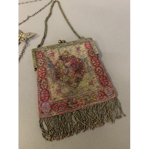 257 - Three good late 19th c to c 1910 evening bags: the first, of chain mesh, with very large and decorat... 