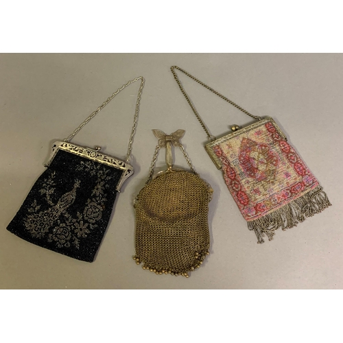 257 - Three good late 19th c to c 1910 evening bags: the first, of chain mesh, with very large and decorat... 